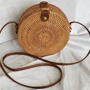 Round ratan purse with floral fabric lining